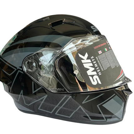 Side profile of SMK Stellar helmet showing ECE 22.06 certification
